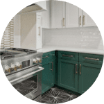 Emerald green kitchen cabinets by Southern Green Builders in Houston